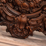 Wood carving of the Virgin Mary in leaves - mokarve