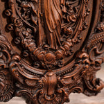 Wood carving of the Virgin Mary in leaves - mokarve